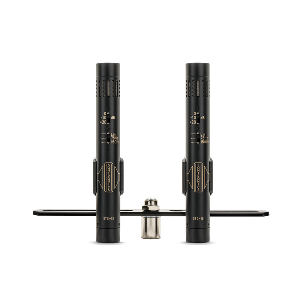 Image on white background of two black Sontronics STC-1S pencil style microphones in their clips on a black mounting bar with silver central nut. The microphones are black with gold lettering and with pad and filter switches above the gold logo