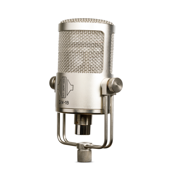 An image on white blackground of a silver-champagne coloured Sontronics DM-1B microphone facing to the left, its chunky cylindrical body sitting in a U-shaped yoke mount that fixes with two thumbscrews to the right and left. The upper two-thirds of the mic is a grille mesh head through which can just be seen the horizontally mounted capsule