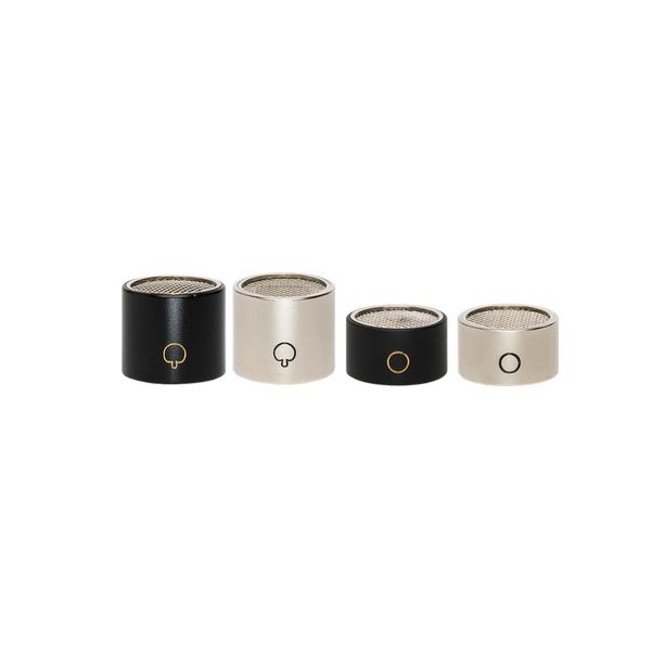 An image on white background showing a line-up of four capsule heads for Sontronics STC-1 microphones, from left to right, a large black Hyper capsule, a large silver Hyper capsule, a smaller black Omni capsule and a silver Omni capsule