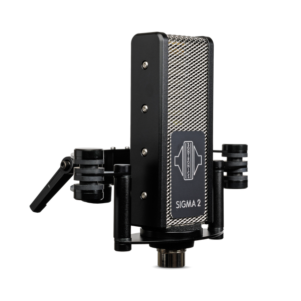 Image on white background of a Sontronics Sigma 2 microphone facing slightly to the right. The rectangular body with its silver mesh grille and black side panels has a black plate on the front engraved with a silver logo and silver 'Sigma 2' name. The microphone sits in its shockmount with two side supports and rear arcs, with the stand mount connector lever just visible